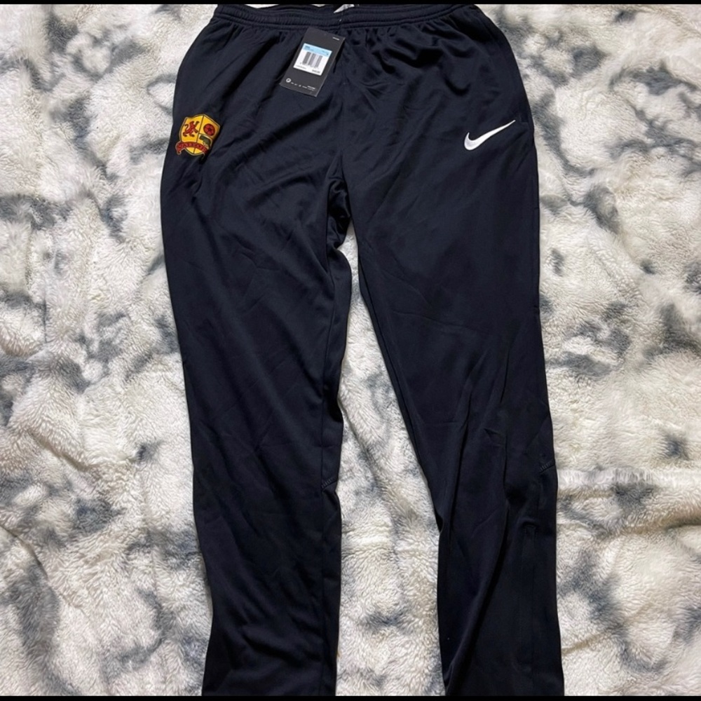 Nike Dri Fit pants.